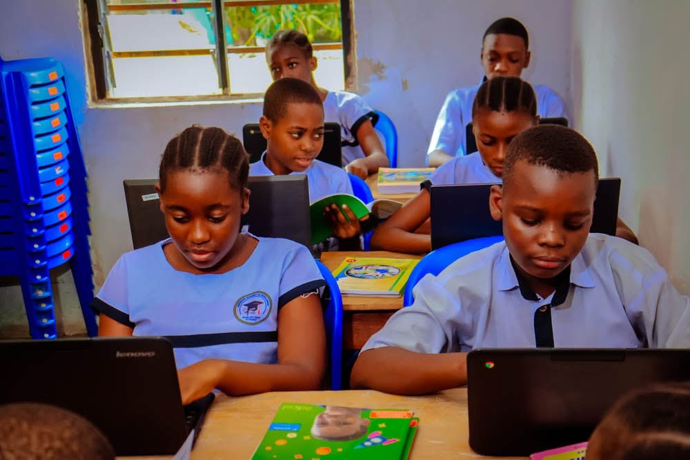 BCP students working on laptops during computer skills training